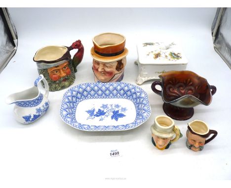 A Spode jug, a rectangular deep dish 9" x 7", a lidded jewellery box, a Carnival glass Octopus bowl and four character jugs i