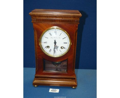A Franz Hermle and Sohn chiming Mantle Clock with pendulum and key, working at time of lotting, 11 3/4" high x 7" wide x 3 1/