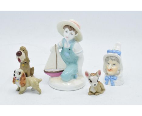 A collection of pottery to include Coalport Ship Ahoy figure, Royal Worcester Candle Snuffer and three Wade Hatbox figures to