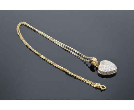 9ct yellow gold and diamond heart pendant on a 9ct gold chain. Total weight 3.7 grams. In good condition. Estimated to be 0.5