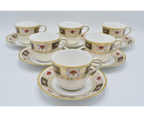 Royal Crown Derby set of 6 trios (6 cups, 6 saucers and 6 side plates) in the Derby Border design (18 pieces). In good condit