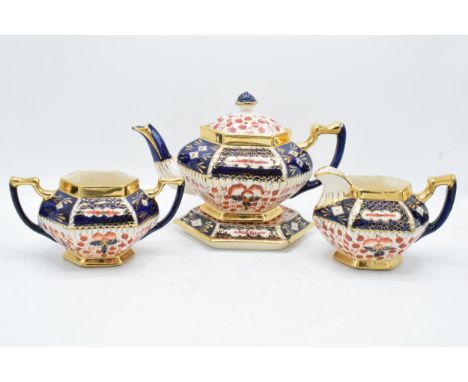 A collection of tea ware to include a Staffordshire pottery 4-piece teaset in the Imari style to include a teapot, teapot sta