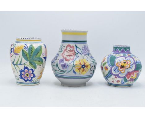 A trio of Poole Pottery vases in similar floral pattwrns to include an ovoid shape 399, 443 and 198 (3). In good condition wi