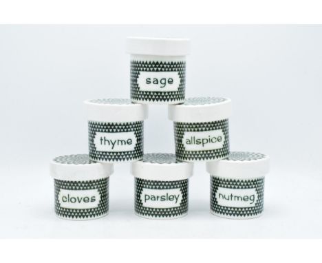 A collection of Poole Pottery spice / herb storage jars to include Cloves, Parsley, Sage, Thyme, Allspice and Nutmeg (6). 7.5