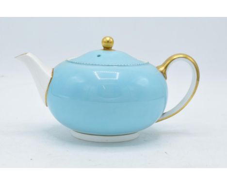 Wedgwood teapot decorated with a light blue and gilded design. In good condition with no obvious damage or restoration. Some 