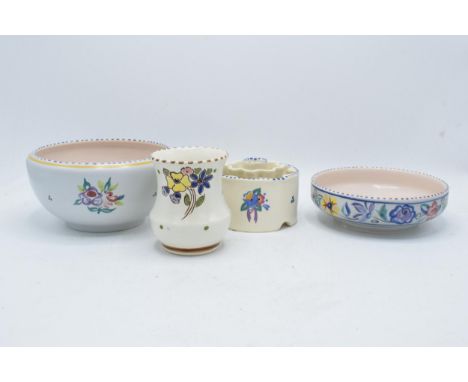 A collection of Poole pottery to include a posy holder 'OX' pattern, a 'KN' high-sided bowl, a shallow bowl and an unmarked v