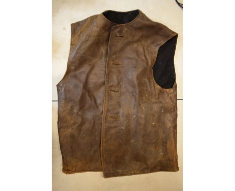 A gent's leather gilet (Jenkins Leather No. 2 Camouflaged), brown with black lining and button front, Size 1. In used conditi