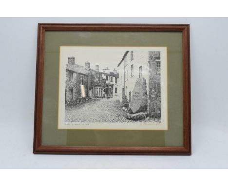 An Alfred Wainwright print with printed title 'Main Street, Dent' and a slightly faded ink signature. 20cm x 15.5cm excluding