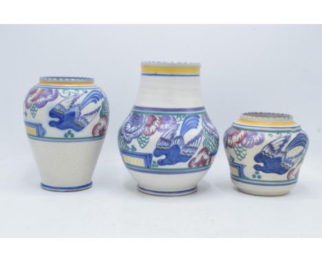 A trio of Carter Stabler Adams Limited Poole Pottery vases in 'PN' design depicting birds amongst foliage to include shape nu