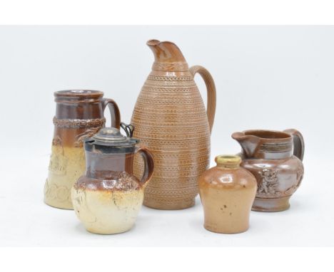 A collection of 19th century stoneware items with traditional scenes to include two-tone examples such as an intricate tall j