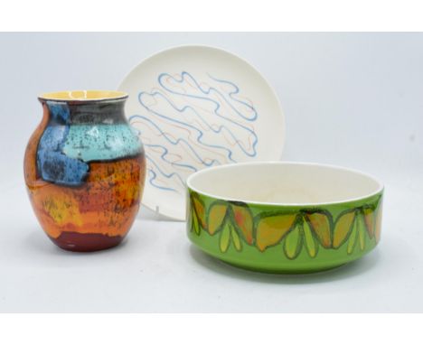 A collection of Poole pottery to include a Delphis vase, a green floral bowl (20cm diameter) and a free-flowing 23cm diameter