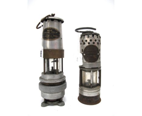 An Ackroyd &amp; Best Ltd. Hailwood Improved Miners Lamp, in aluminium and brass, 34cm high including suspension hook; A Nayl