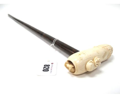 An Early XX Century Walking Stick, the bone handle carved as a cat sat on a corn on the cob, a mouse peeping out at one end, 