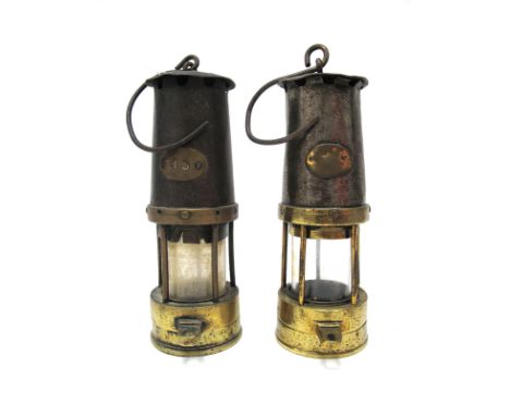A W.C. and I Co. Ltd Miners Safety Lamp, stamped "497", the base plaque inscribed "45", 33cm high including suspension hook; 