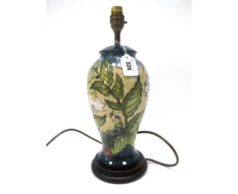 A Modern Moorcroft Pottery Table Lamp, of baluster form, painted in the 'Strawberry Plant and Butterfly' pattern, mounted on 