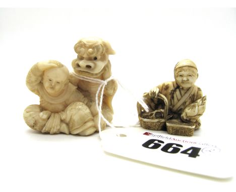 A Late XIX Century Japanese Ivory Netsuke, carved as two seated boys, one wearing a shishi mask, the other a drum, signed, 4c