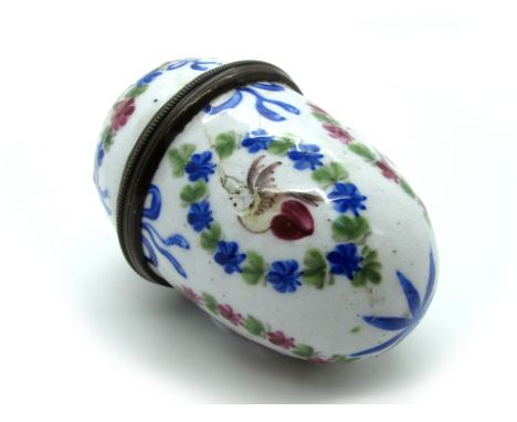 A Late XVIII Century Enamel Egg Shaped Nutmeg Grater, painted with birds and hearts within floral cartouches within a border 