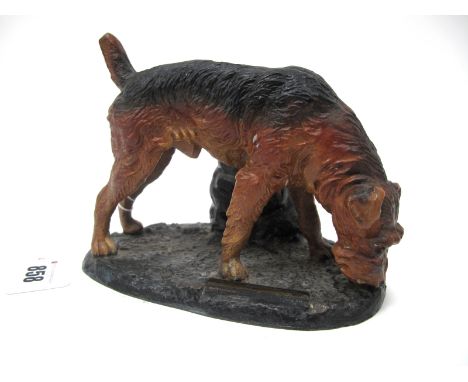 An Early XX Century Austrian Cold Painted Lighter, modelled in the form of a dog upon naturalistic oval base, 13cm high.