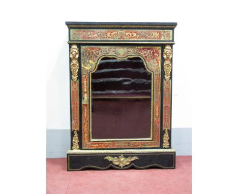 A XIX Century Ebonised Boulle Cabinet, with ormolu mounts, glazed door to internal shelf, on shaped base, 110cm high, 81cm lo