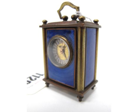 An Early XX Century Miniature Brass and Blue Enamel Carriage Clock, of rectangular form, the circular dial with Roman numeral