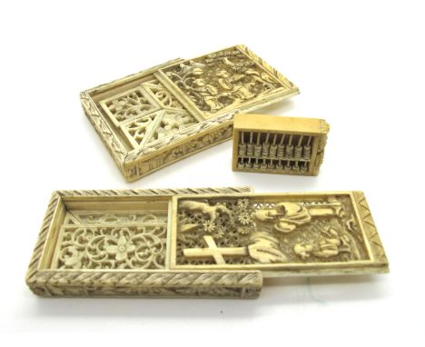 A Chinese Canton Late XIX Century Ivory Box, of square form, carved with figures in a garden, the sliding lid opening to reve