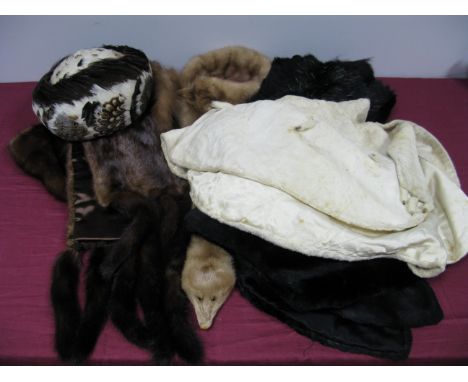 A Light Brown Mink Stole, with five tail tassels to each end, a moleskin cape retailed by "Faulkes Furriers, Birmingham 15", 
