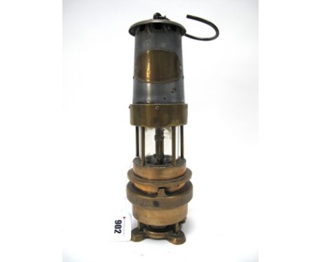 A Naylor Spiralarm Brass Miners Lamp, type M, No. 2078 by J.H. Naylor, 40cm high including suspension hook.