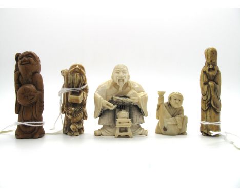 A Late XIX Century Japanese Netsuke, carved as a standing figure of Fukurokuju, 6cm high; A Japanese Ivory Netsuke, of a Sage