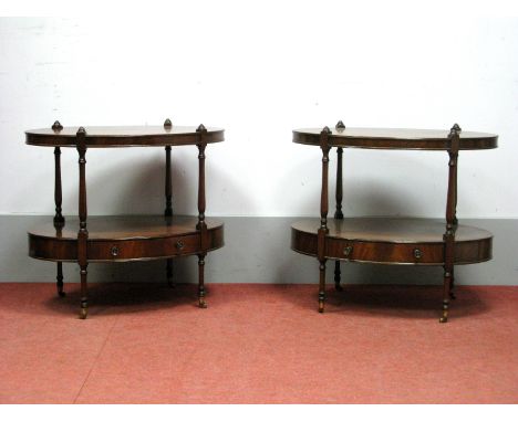 A Pair of Mahogany Two Tier Lamp Tables, with turned finials and crossbanded tops on turned and block supports, with single d