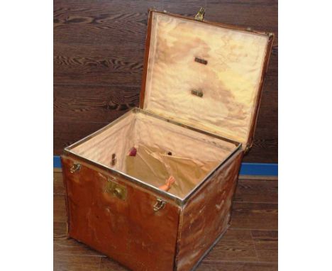 LEATHER AND CANVAS SQUARE TRAVEL TRUNK
with brass 'Featherweight' trademark badge, 46cm high