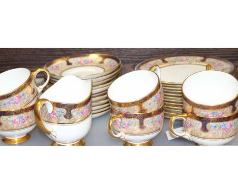 PARAGON PART TEA SET
of floral and gilt design, comprising tea cups, suacers, milk jug and side plates (32 pieces)