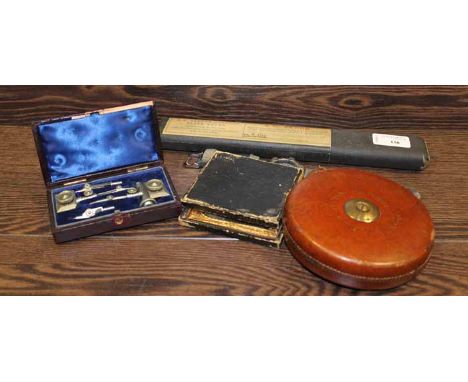 VINTAGE TAPE MEASURE
along with a cased instruments set, wristwatch and Daguerreotype, also a slide rule