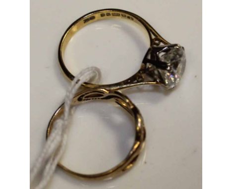 18CT GOLD WHITE GEM SET SOLITAIRE RING
together with a gold knot ring (2)