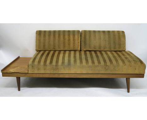 A MID CENTURY INGMAR RELLING TEAK SOFA BED, with adjustable side shelf and lower compartment, 76cm high x 195cm wide x 75cm d