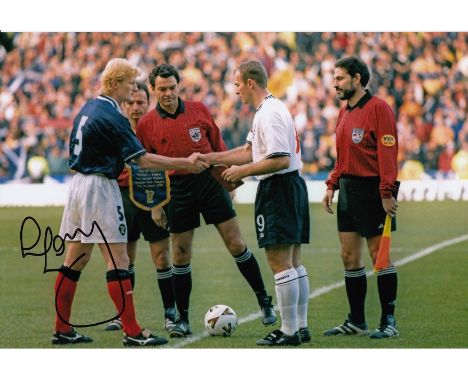 Football Autographed 12 x 8 photo, a superb image depicting COLIN HENDRY, Scotland's captain, shaking hands with his English 