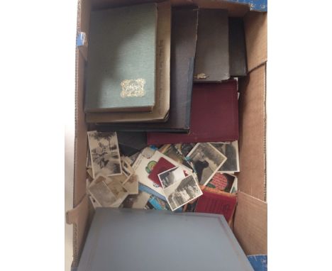 A large collection of old photograph albums & loose photographs & postcards c1910-1950s to include vintage cars, boats, hunti