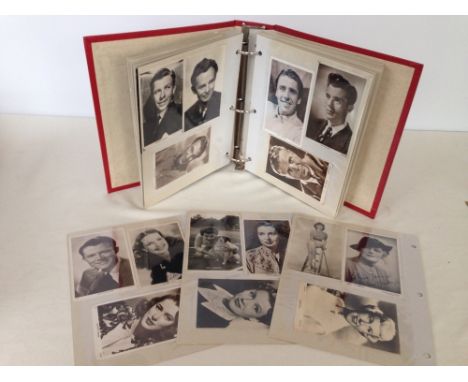 A large album of film star & celebrity autographs to include Paul Newman, Margot Fonteyn, Benny Hill, Elton John, Lillie Lang