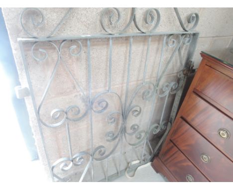 A galvanised garden gate