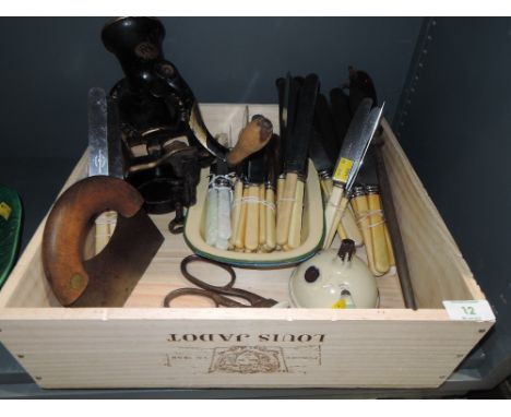 A good selection of kitchen wares including Spong mincer and enamel wares