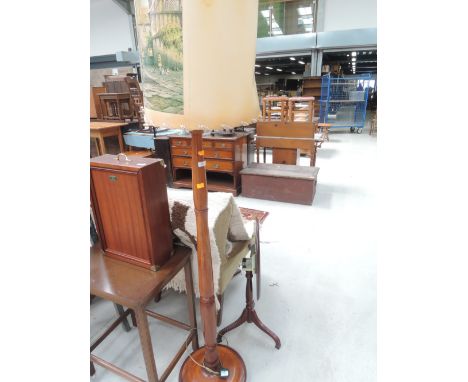 A vintage standard lamp and hunting themed shade