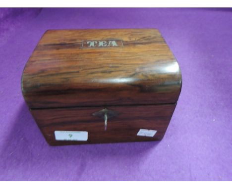 An early 20th century rose wood and inlay tea caddy 