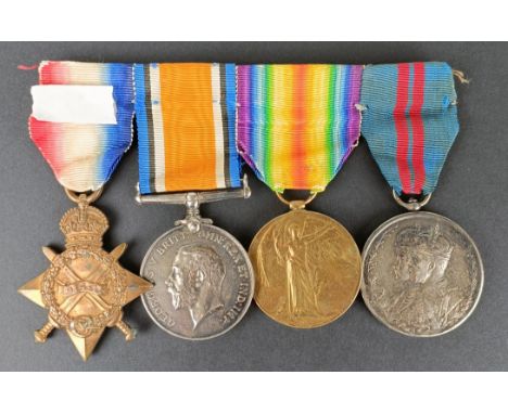A group of four medals, awarded to 12477 Cpl G Andrews R Fus, comprising a 1914-15 Star trio, and a Delhi Durbar 1911 medal (