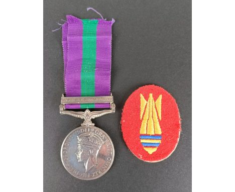 A General Service medal 1918-62, awarded to 11565031 Dvr J Mortimer RE, with Bomb &amp; Mine Clearance 1945-49 clasp, with a 