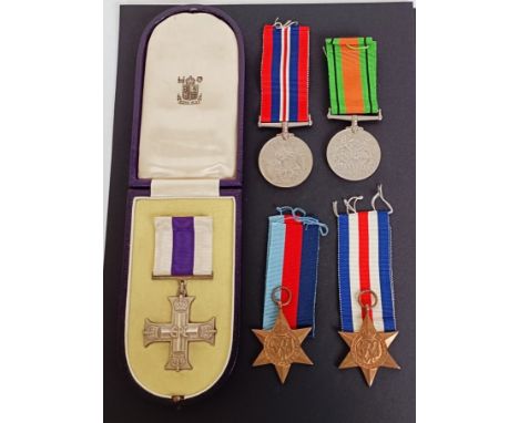 A group of five medals, awarded to Lt W Flint 61st Recce Rgt RAC, comprising a Military Cross (MC), 1939-1945 Star, France an