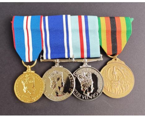 A group of four medals, awarded to Constable David M Edwards, comprising a Golden Jubilee medal 2002, Police Long Service med