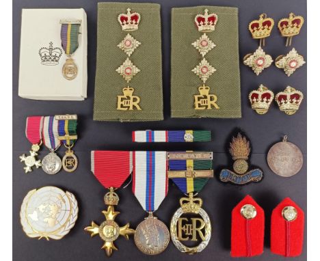 A group of three medals, awarded to Col K W Dale RE, comprising an OBE, a Jubilee medal 1977, and an Efficiency Decoration an