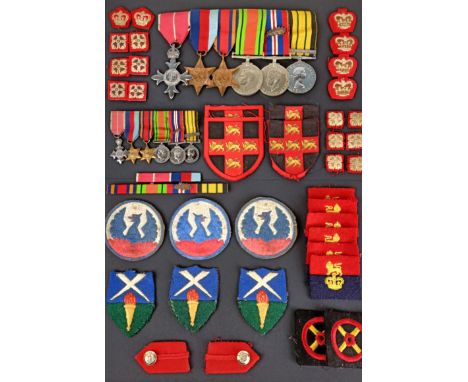 A group of six medals, awarded to Colonel R C Thompson, Staff, comprising an OBE, a 1939-1945 Star, Burma Star, Defence medal