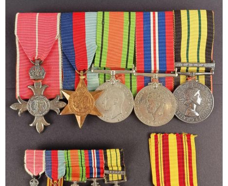 A group of five medals, awarded to Major J W R Woodcock, RAEC and Coldstream Guards, comprising an MBE, 1939-1945 Star, Defen