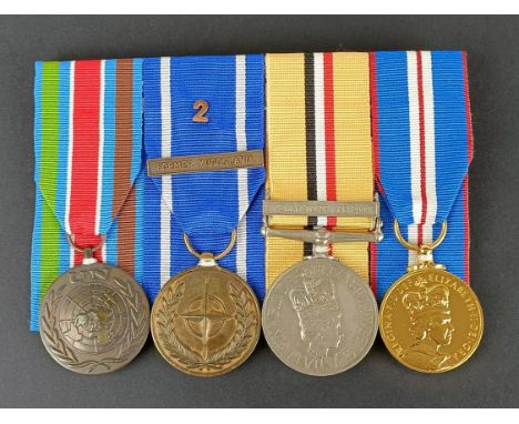 A group of four medals, awarded to 25015106 Cpl R A Telling REME, comprising a United Nations medal, UNPROFOR &amp; UNCRO, a 