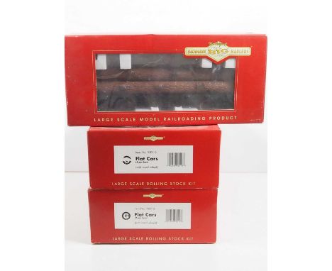 A group of BACHMANN Big Haulers G gauge wagons comprising 5x flat cars with 4 log loads in three boxes, together with two ext